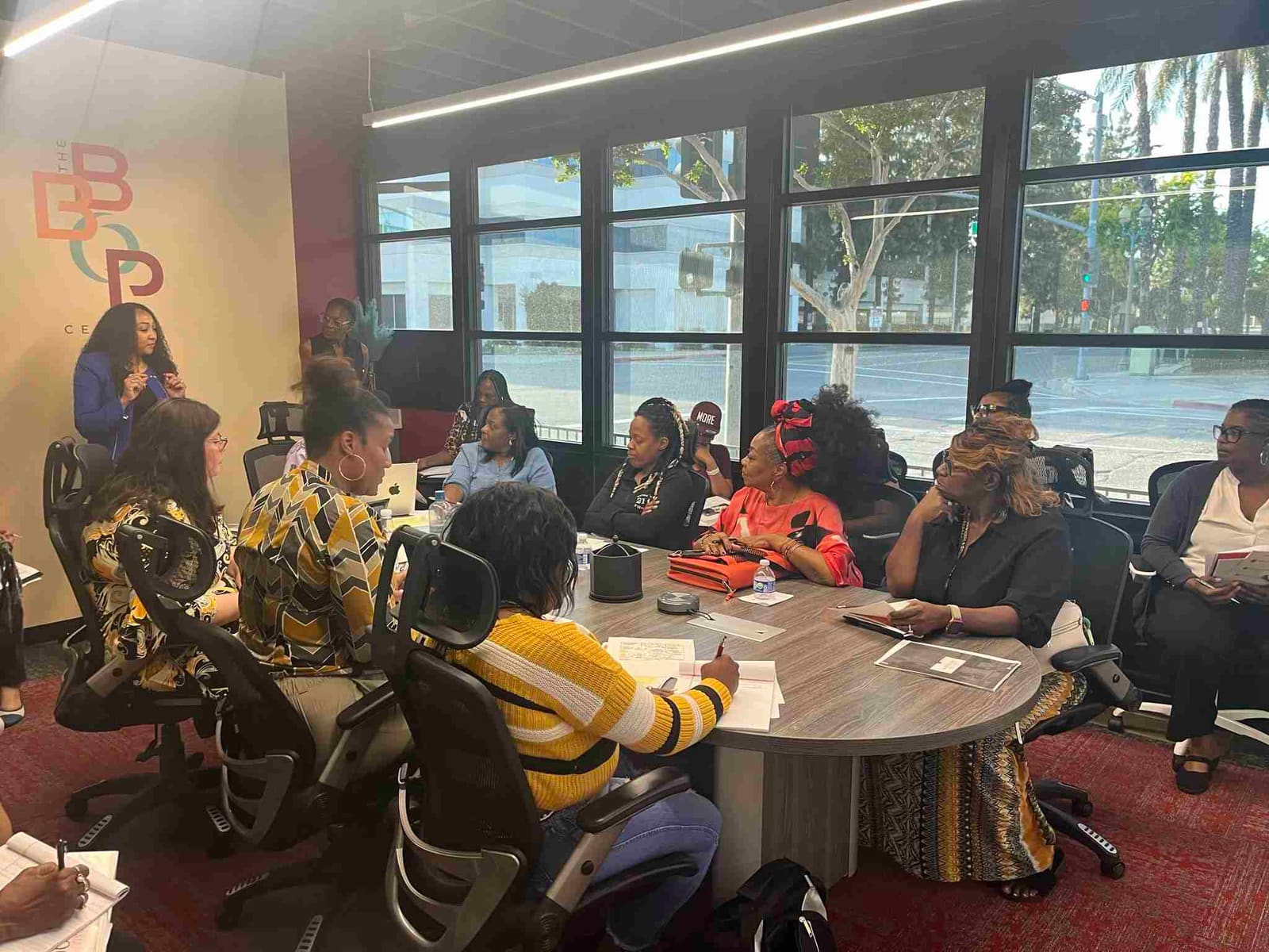 Women founders in session around a table at the BBOP Center