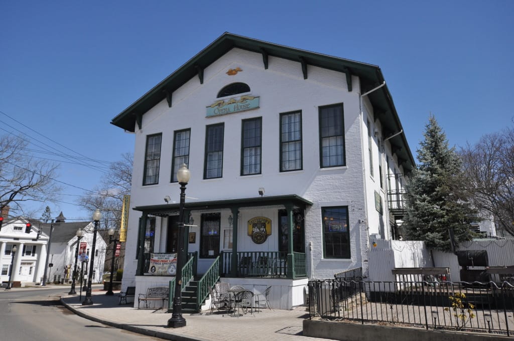 The brick former Bethel Opera House on Greenwood Avenue, with a bracketed cornice