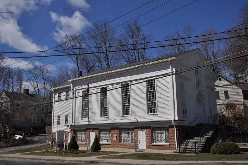 A clapboarded former meeting house on Greenwood Avenue