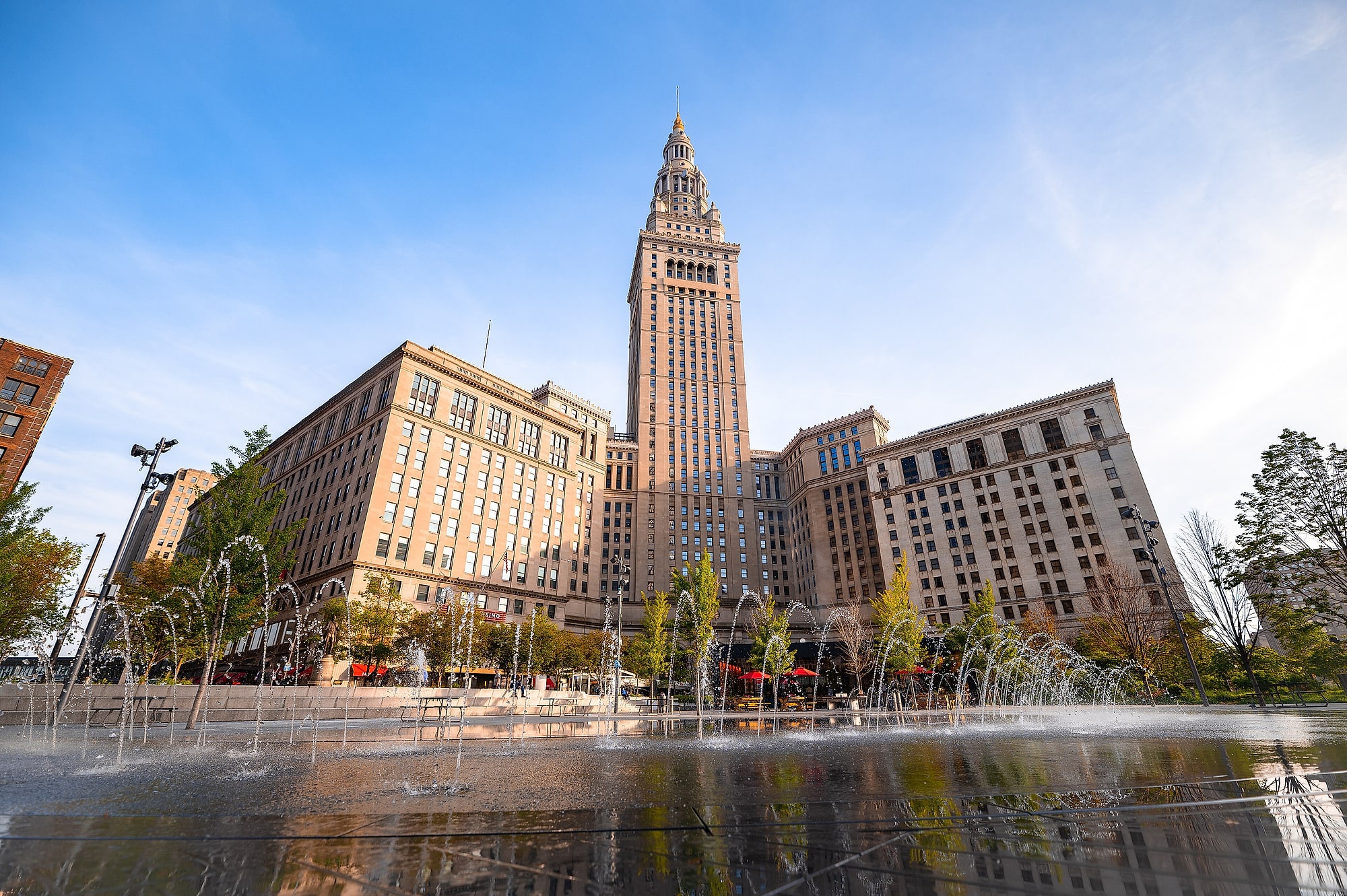Public Square in downtown Cleveland with the Terminal Tower rising behind its fountains and civic lawn.
