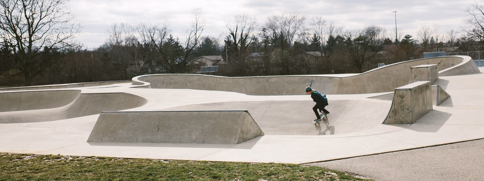 A skateboarder in the bowl at the Oak Creek South skatepark