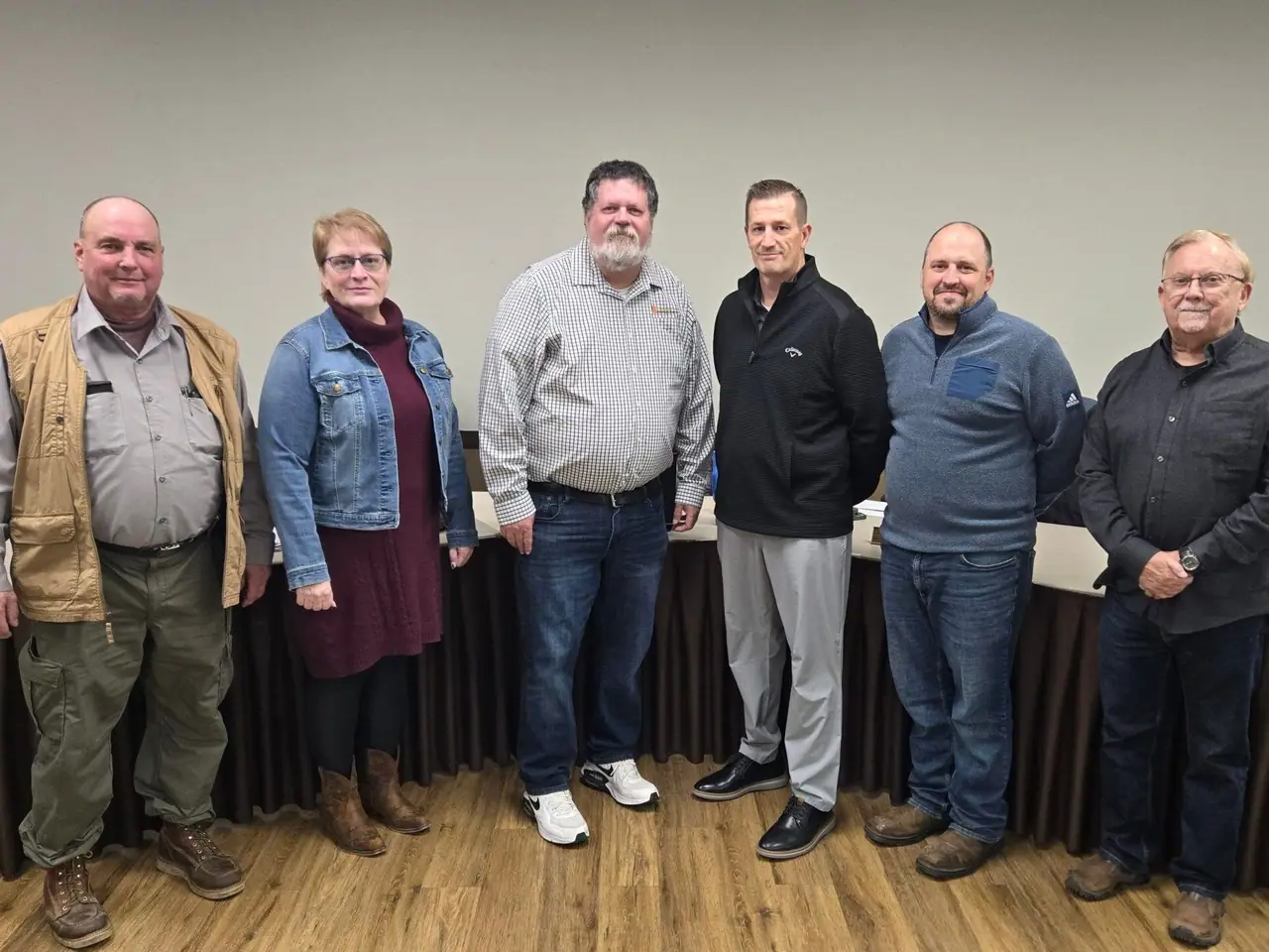 Members of the Edgerton City Council stand together for a group photograph.