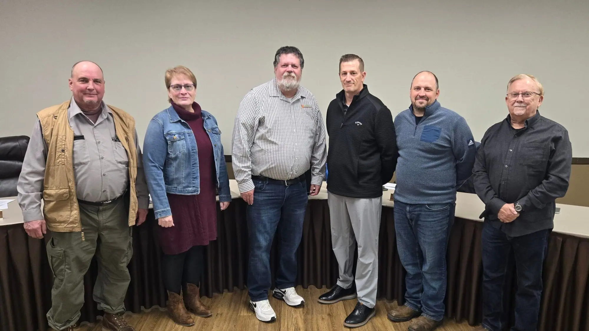 Members of the Edgerton City Council stand together for a group photograph.