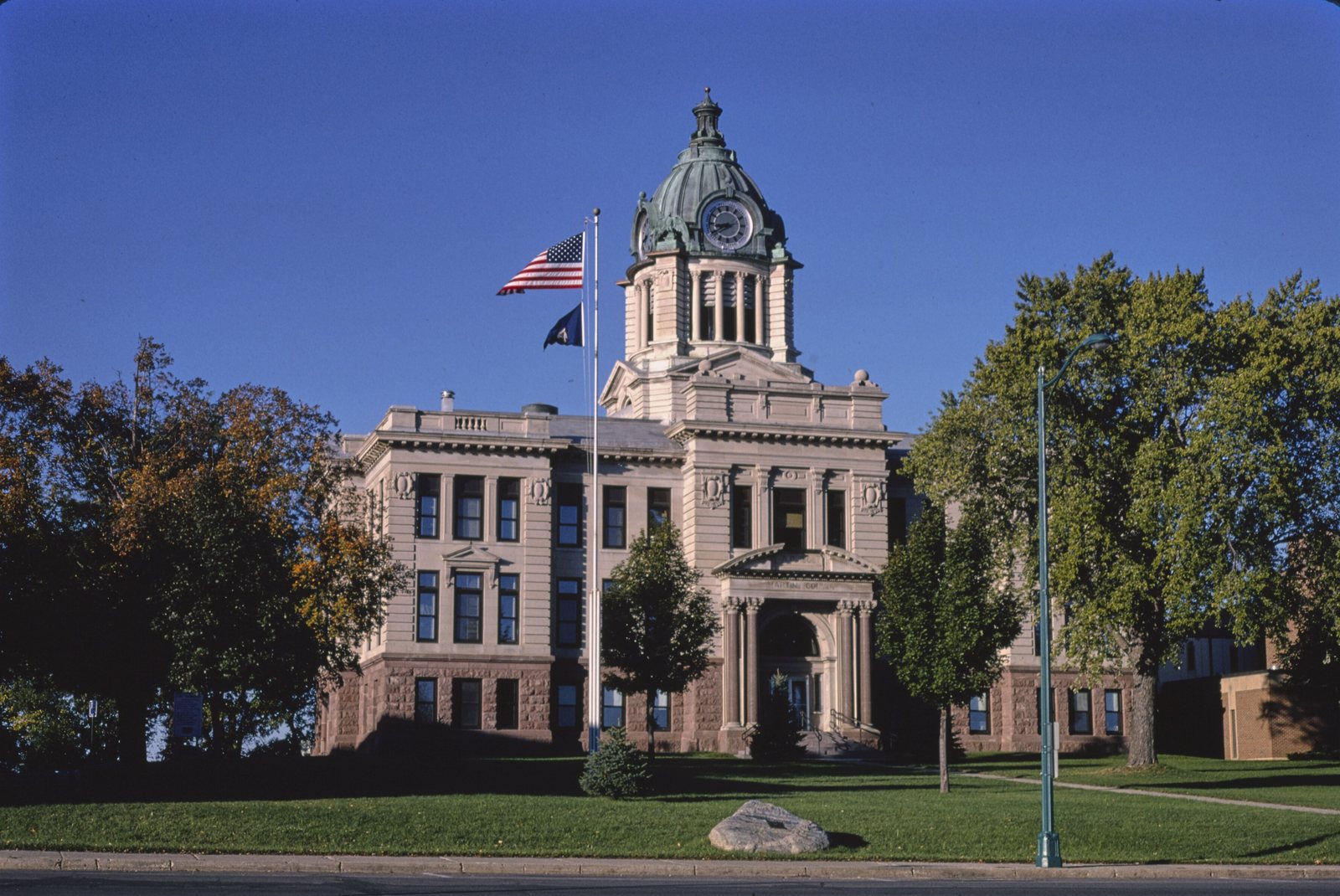 The domed 1907 Martin County Courthouse in Fairmont with flags flying