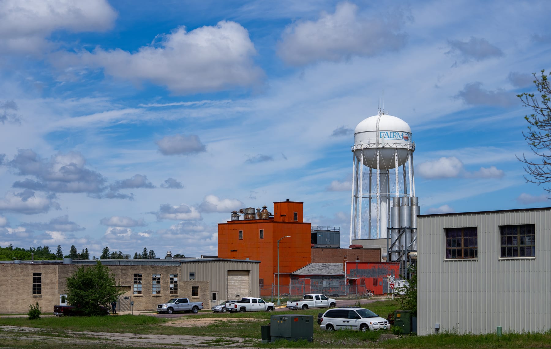The lettered Fairmont water tower above the trees