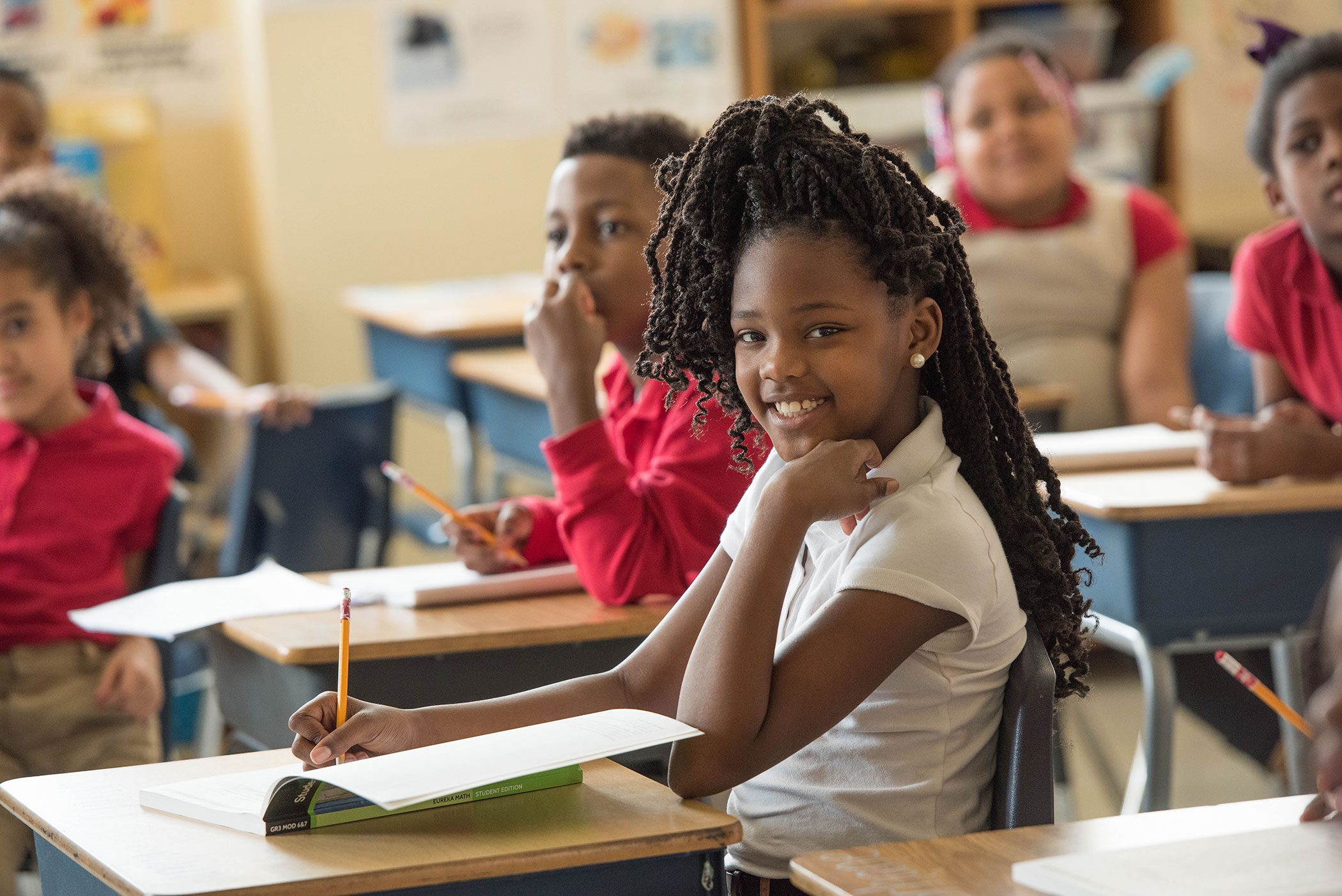 Friendship scholars in a classroom.