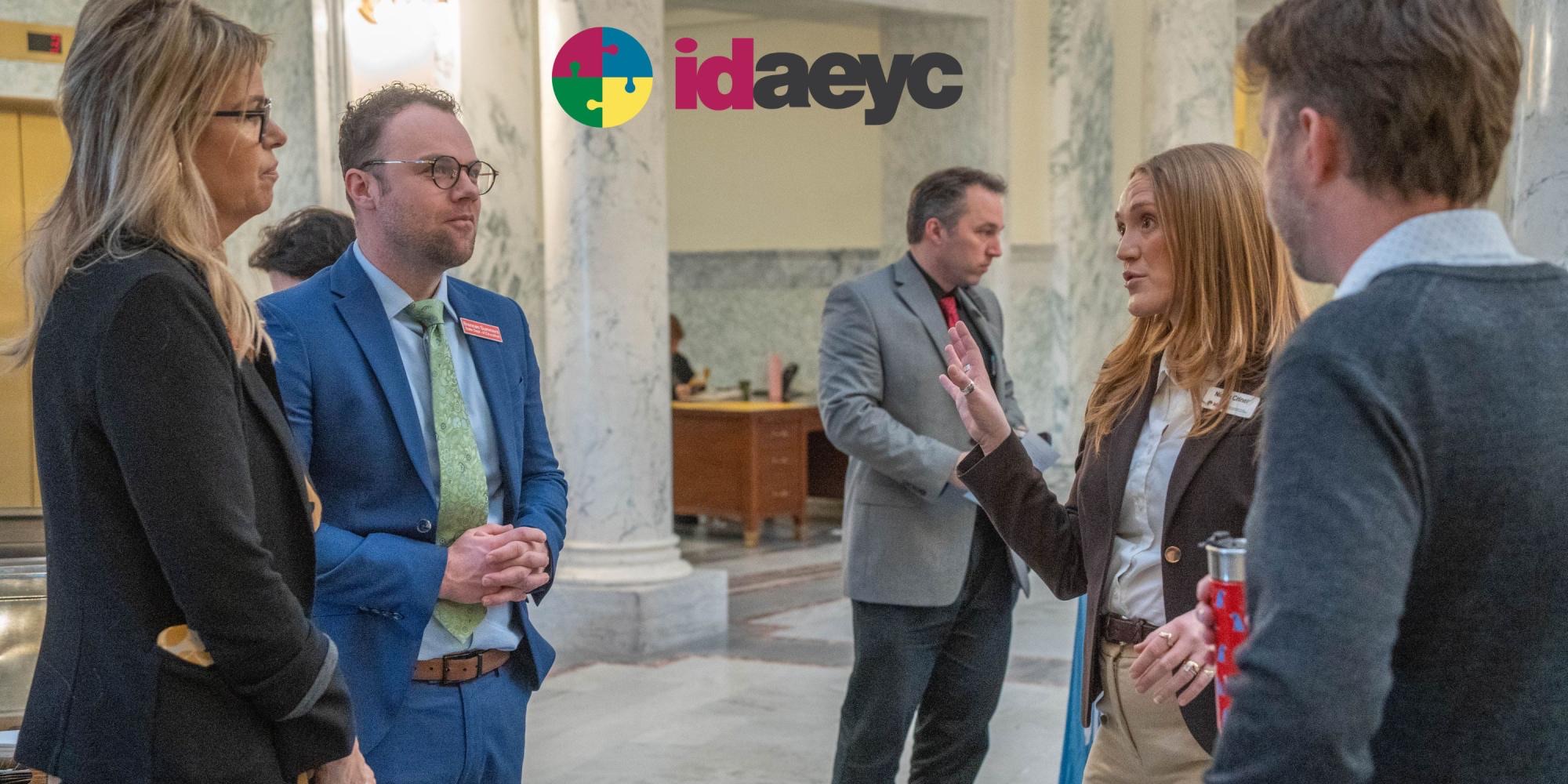 Early learning advocates and partners talking in the Idaho State Capitol during Early Learning Day