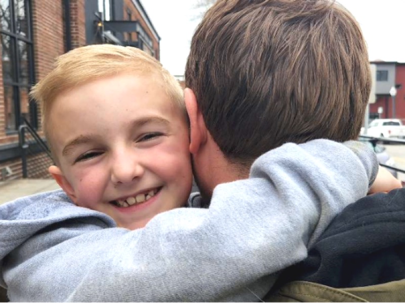 A father and son playing together