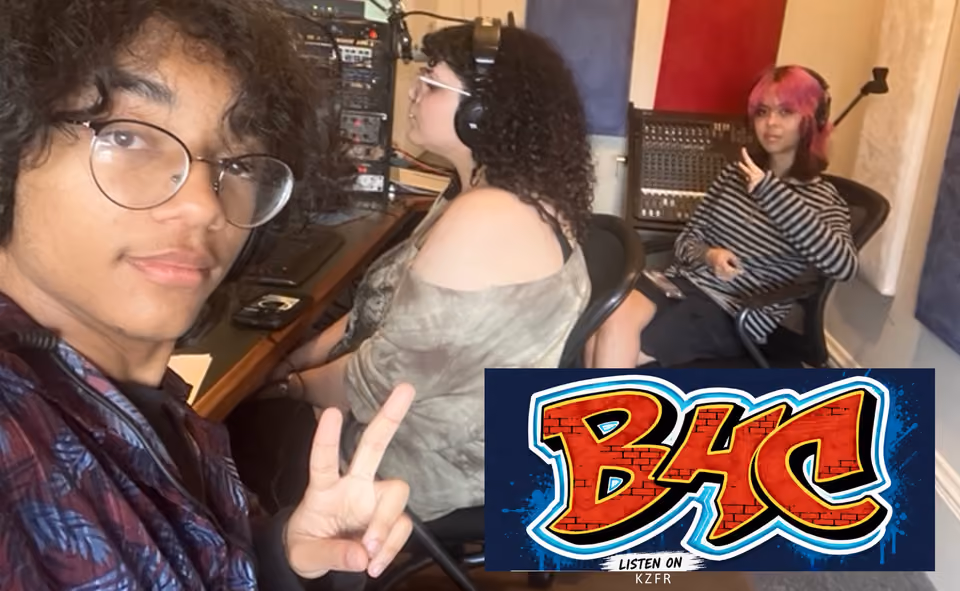Three young people in a radio studio, one flashing a peace sign, with a graffiti-style "BHC Listen on KZFR" logo overlaid