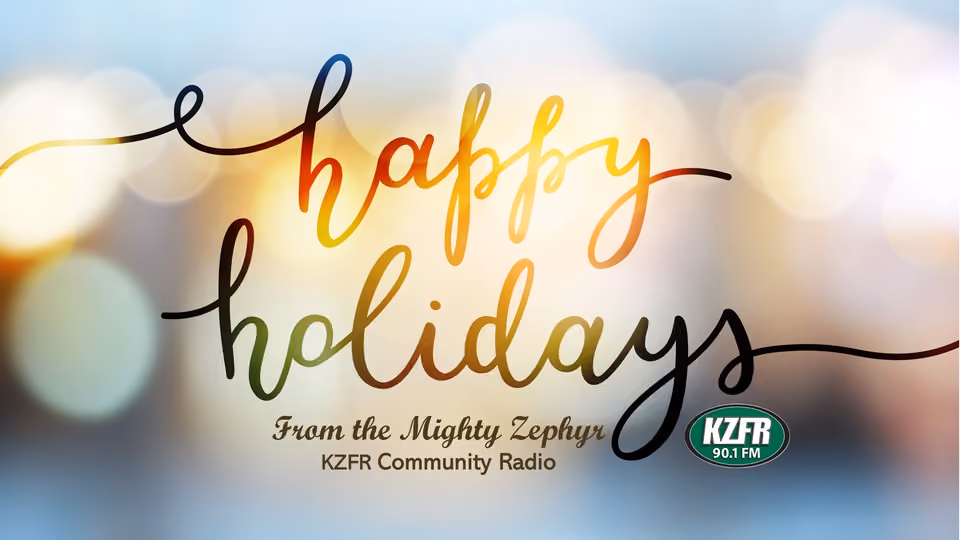 Holiday greeting graphic reading "Happy holidays from the Mighty Zephyr, KZFR Community Radio" in script over a glowing blurred background, with the KZFR 90.1 FM logo