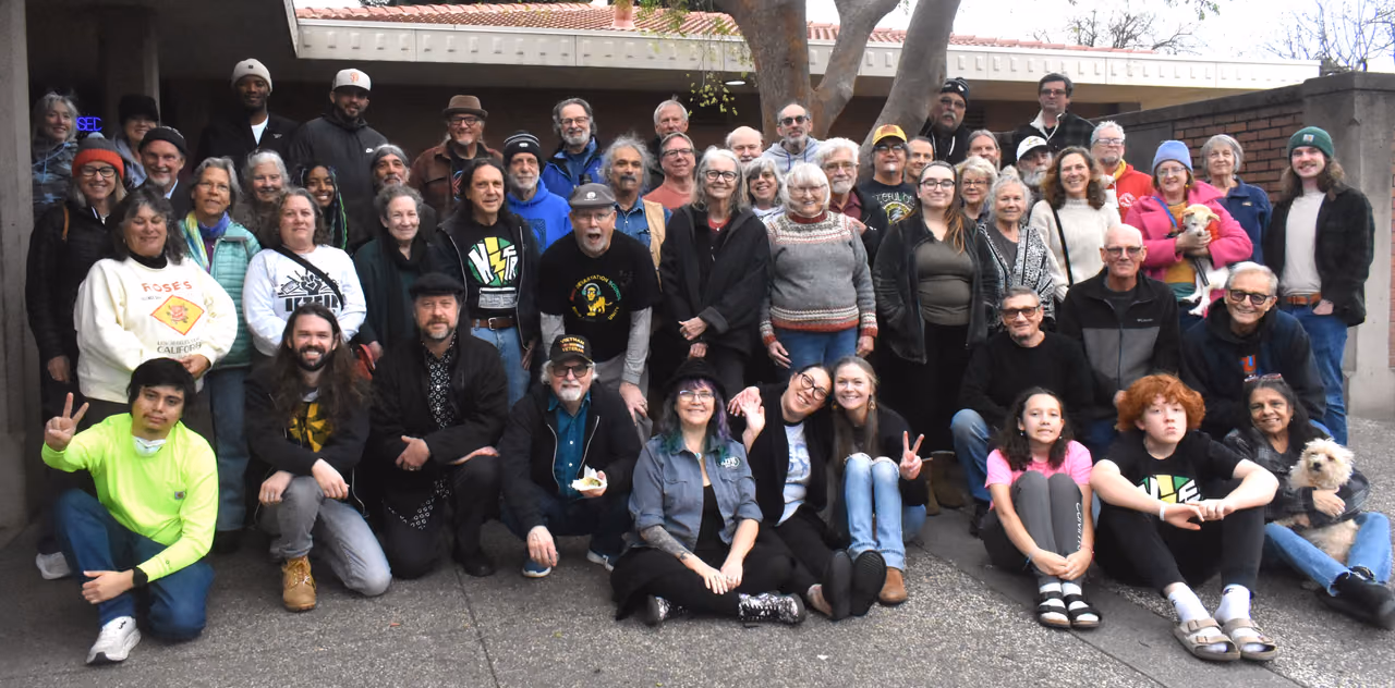 Dozens of KZFR programmers, staff and volunteers gathered for a group photo at the spring 2025 All Station Meeting.