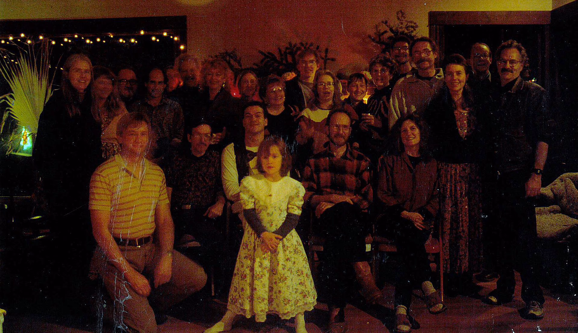The original KZFR crew, a crowd of programmers and volunteers, in a warm-toned photo from 1992.