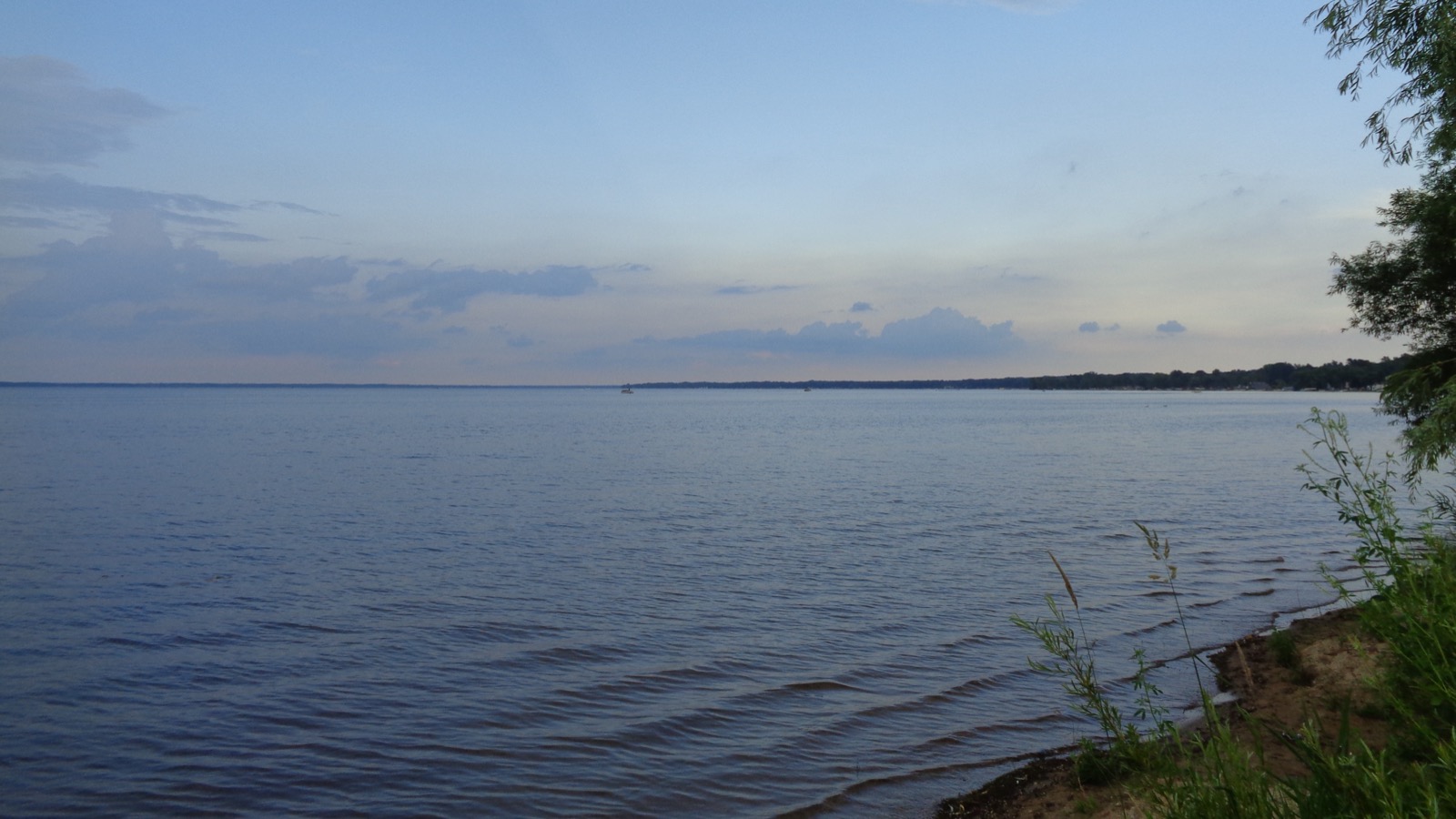 The open water of Houghton Lake under a wide Michigan sky