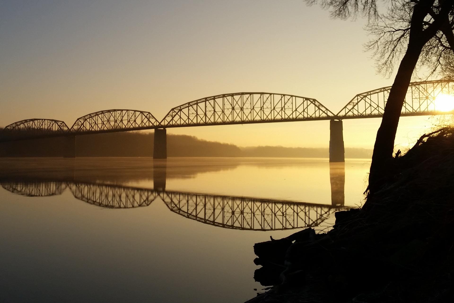 The Champ Clark Bridge at sunset, crossing the Mississippi River at Louisiana, Missouri.