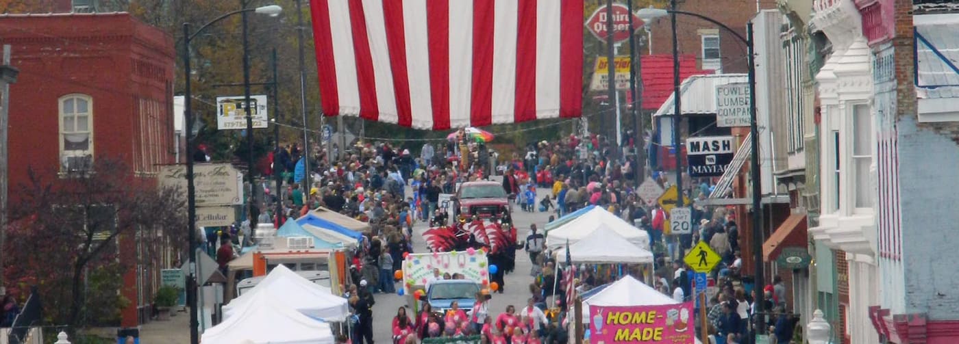 Crowds fill Georgia Street in downtown Louisiana during the Colorfest festival.