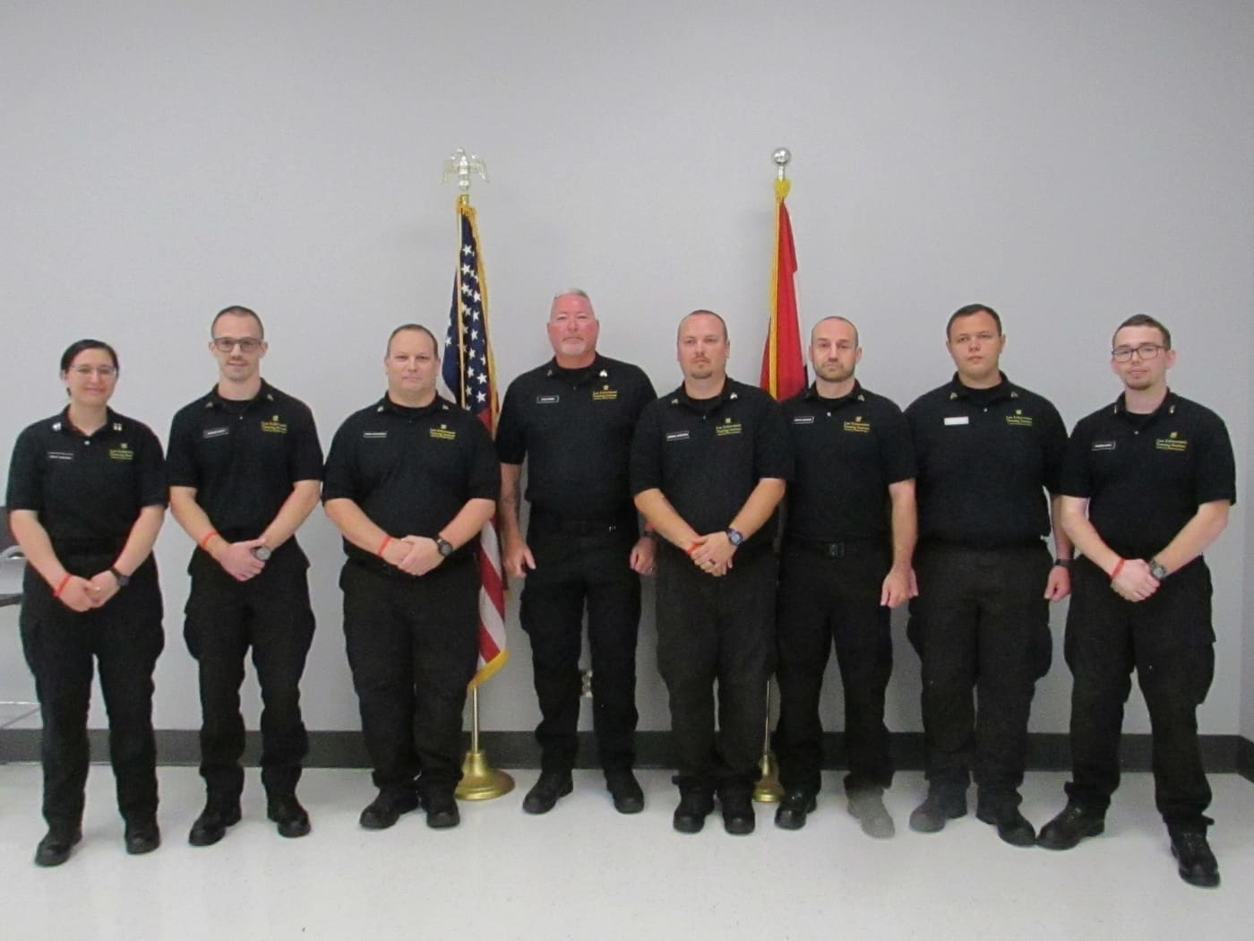 The Louisiana Police Department staff standing together outside the station.