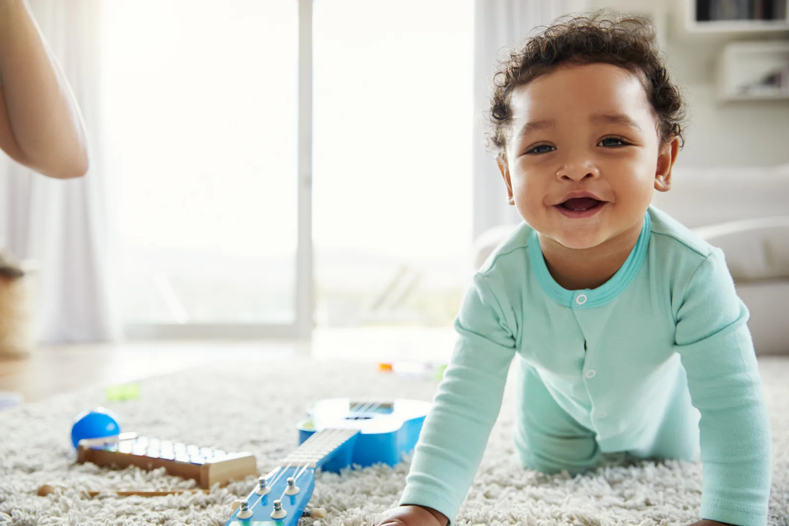 A baby playing at home
