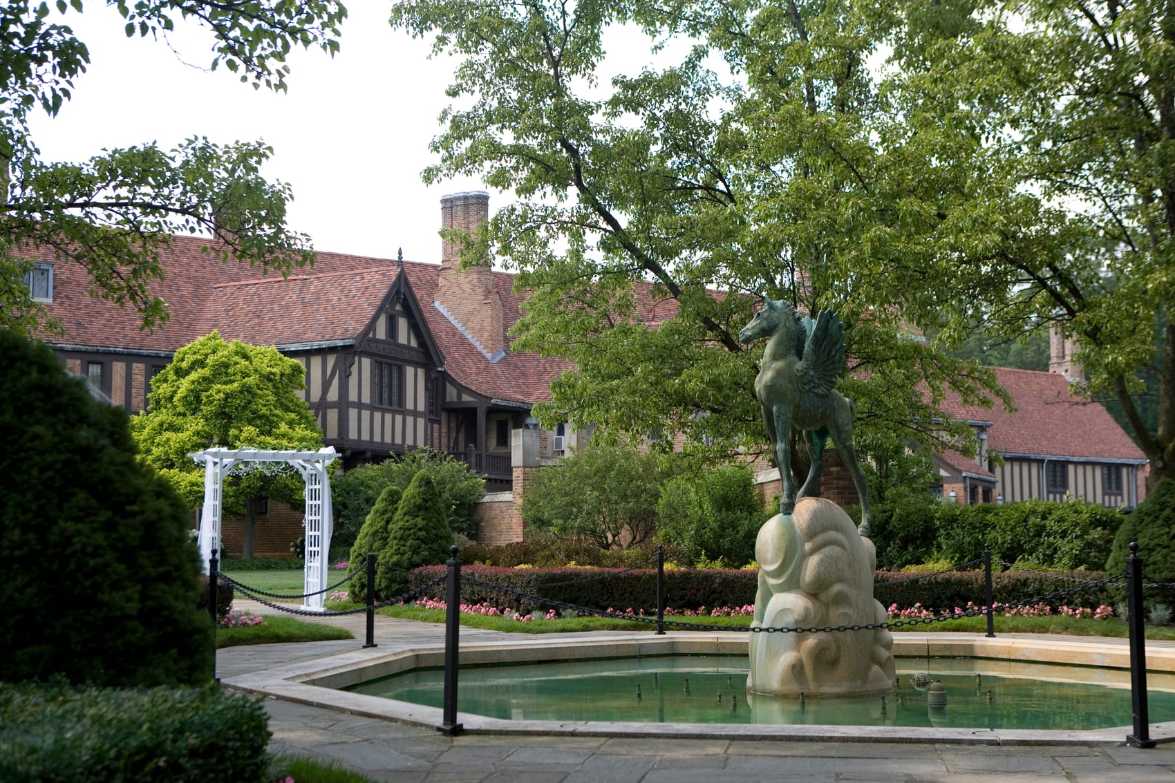 The Pegasus fountain and gardens at Meadow Brook Hall, the Tudor-revival mansion Oakland University was founded on