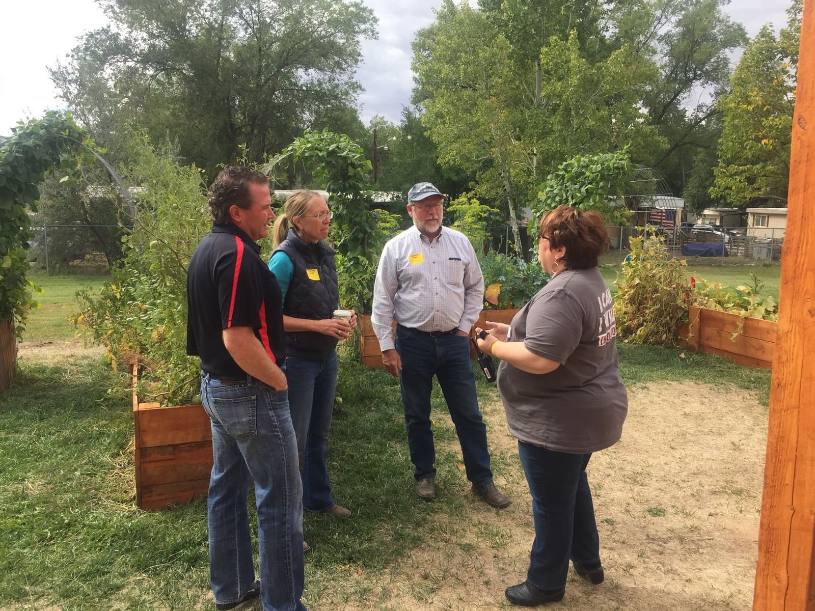 A Montezuma Orchard Restoration Project visit among raised beds and orchard trees