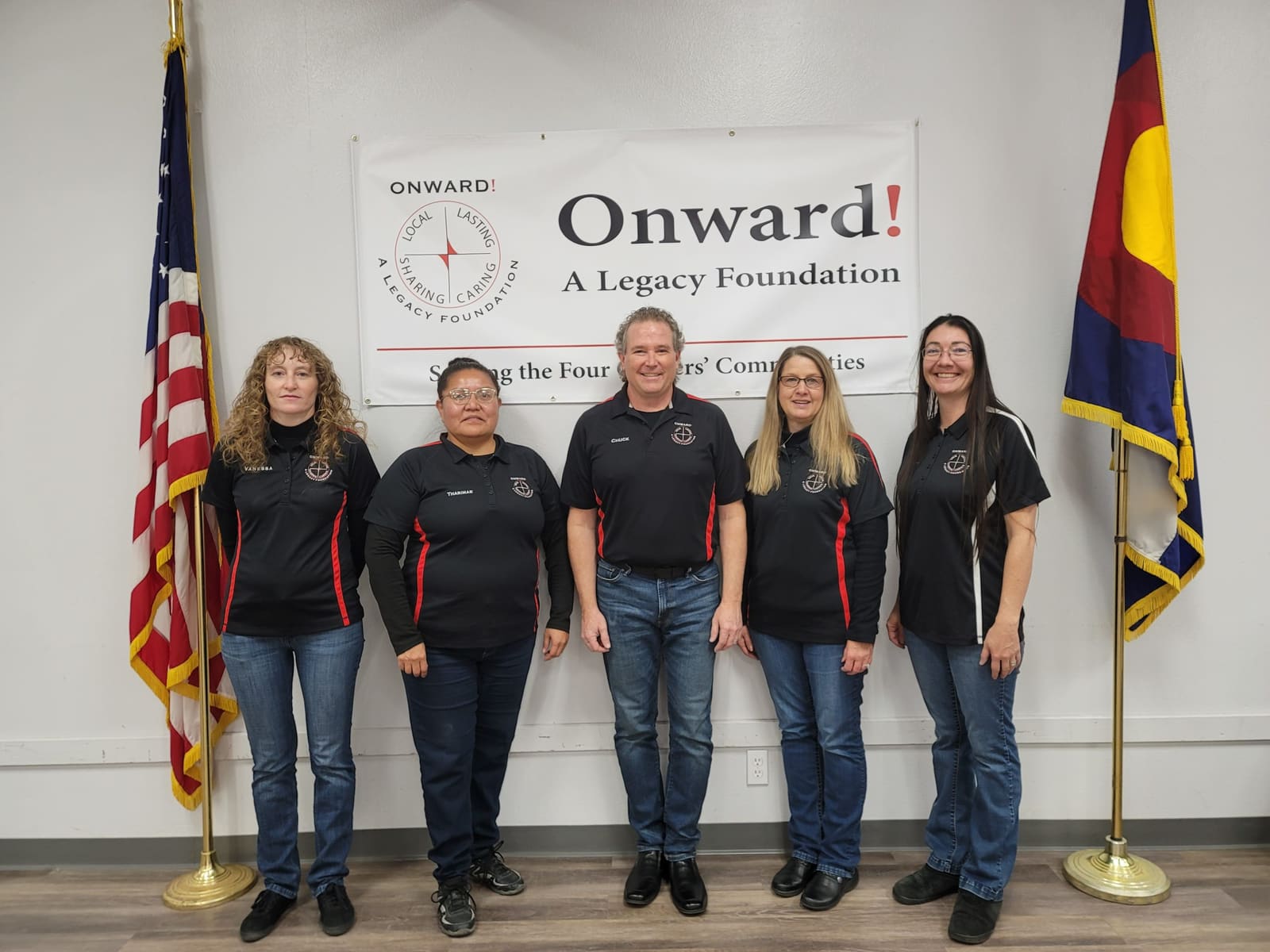 The Onward! staff in front of the Onward! banner, 2023