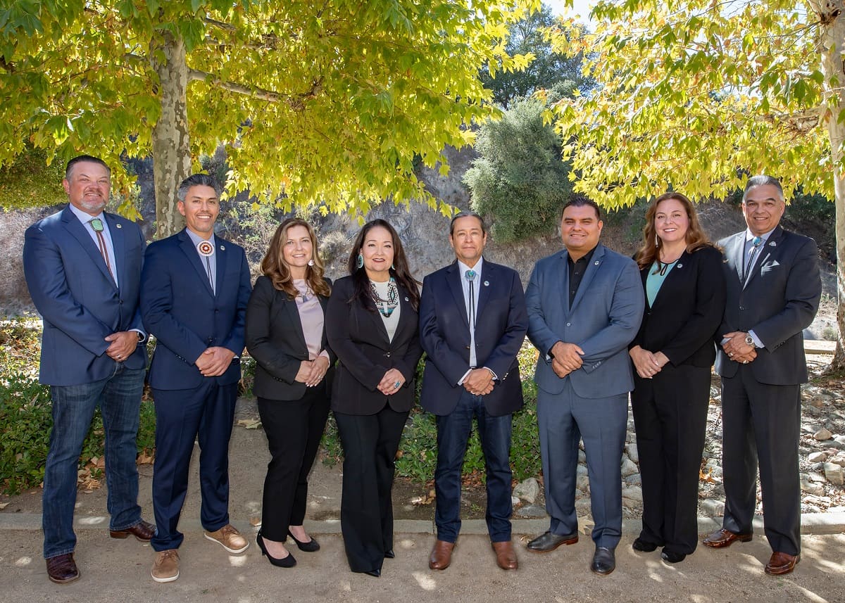 The Pechanga Tribal Council standing together under the oaks