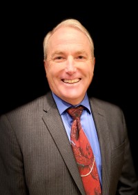 Commissioner Curtis J. Knapp