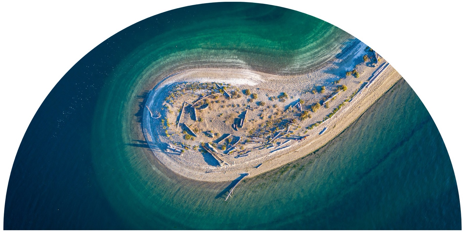 Aerial view of Tacoma DeMolay Sandspit and surrounding blue water.