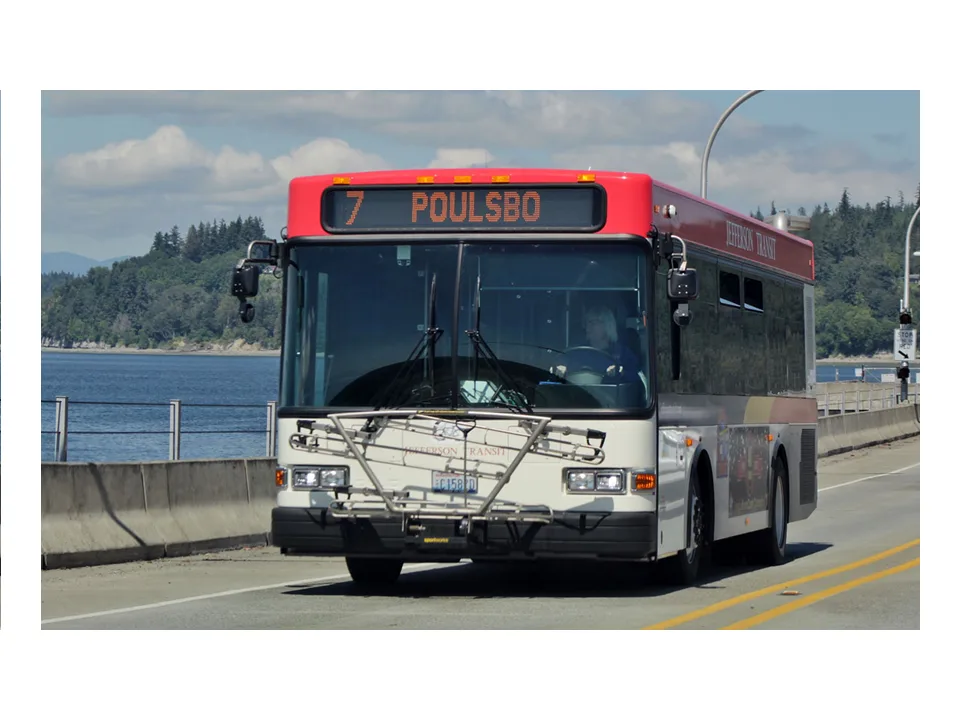 Jefferson Transit bus on Route 7 to Poulsbo, crossing a bridge over open water.