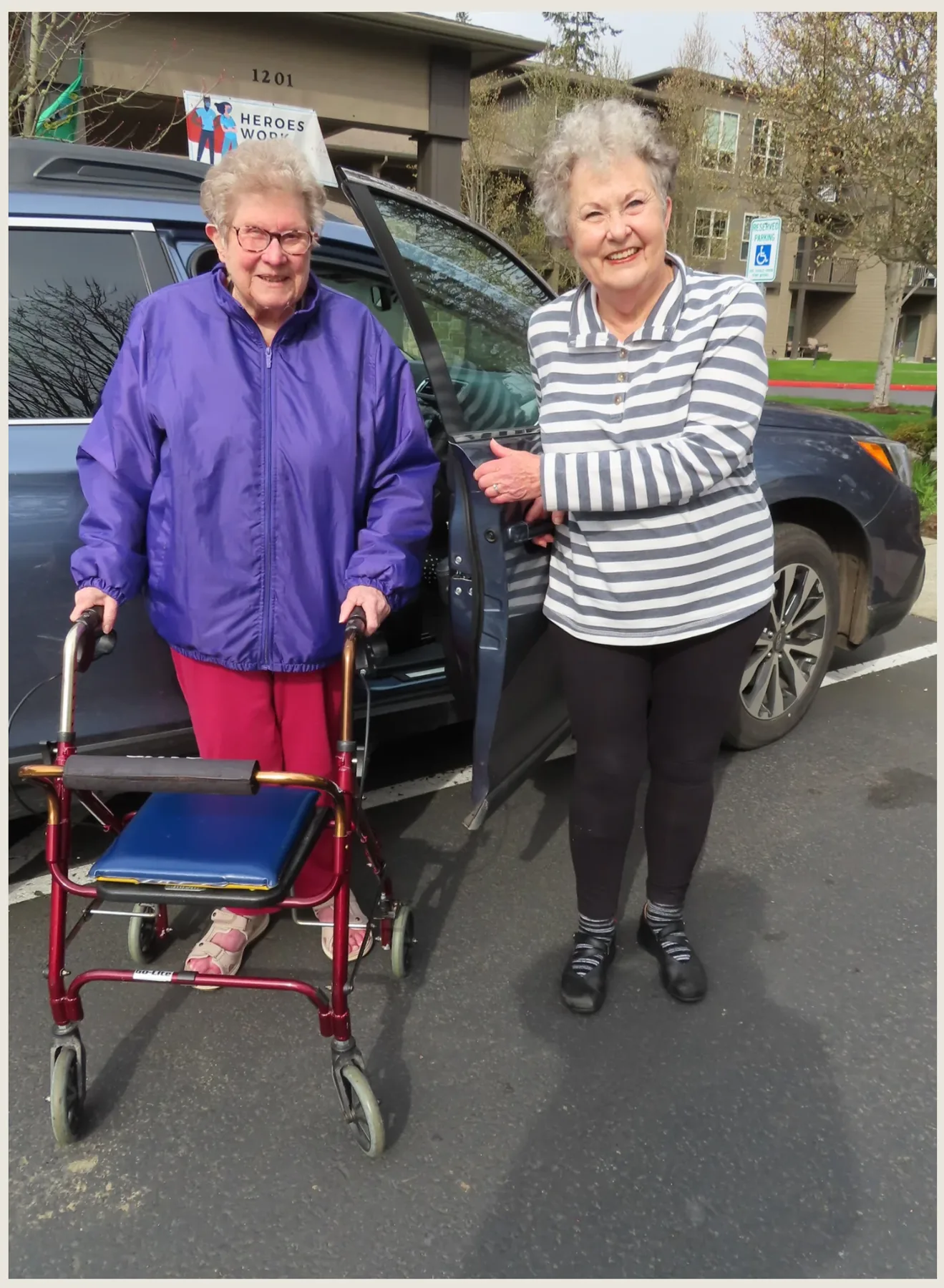 Person assisting someone using a walker.