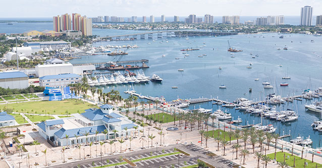 Aerial view of the Riviera Beach marina: docks, boats, the event center, and the Intracoastal Waterway.