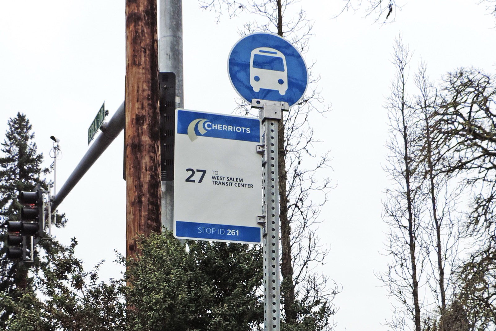 A Cherriots stop flag for Route 27 to West Salem Transit Center, showing Stop ID 261