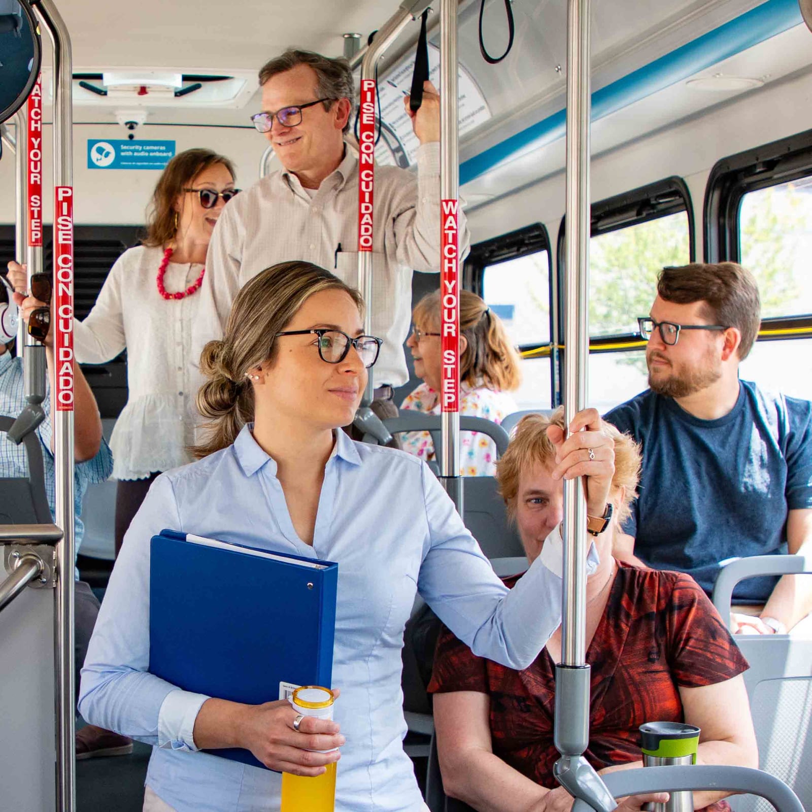 Riders seated and standing aboard a Cherriots Local bus