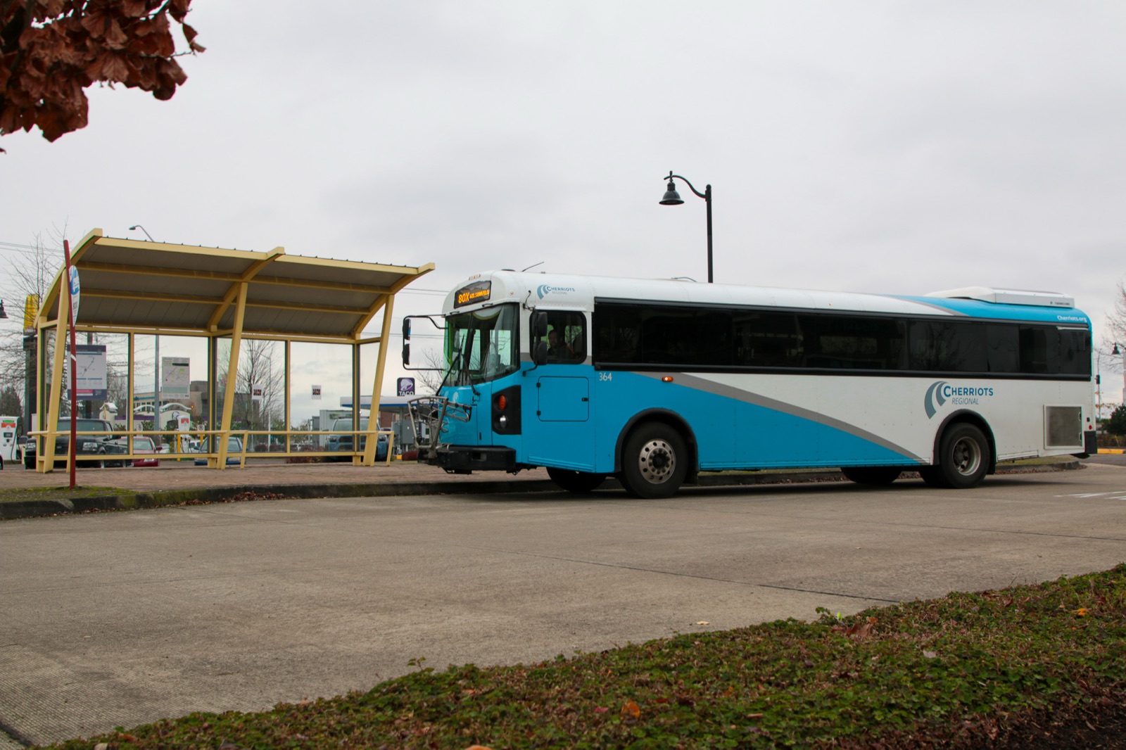 A Cherriots Regional coach waiting at Woodburn Transit Center