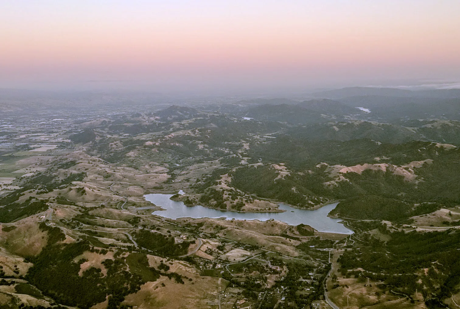 Aerial view of Calero Reservoir and the dry foothills south of San Jose