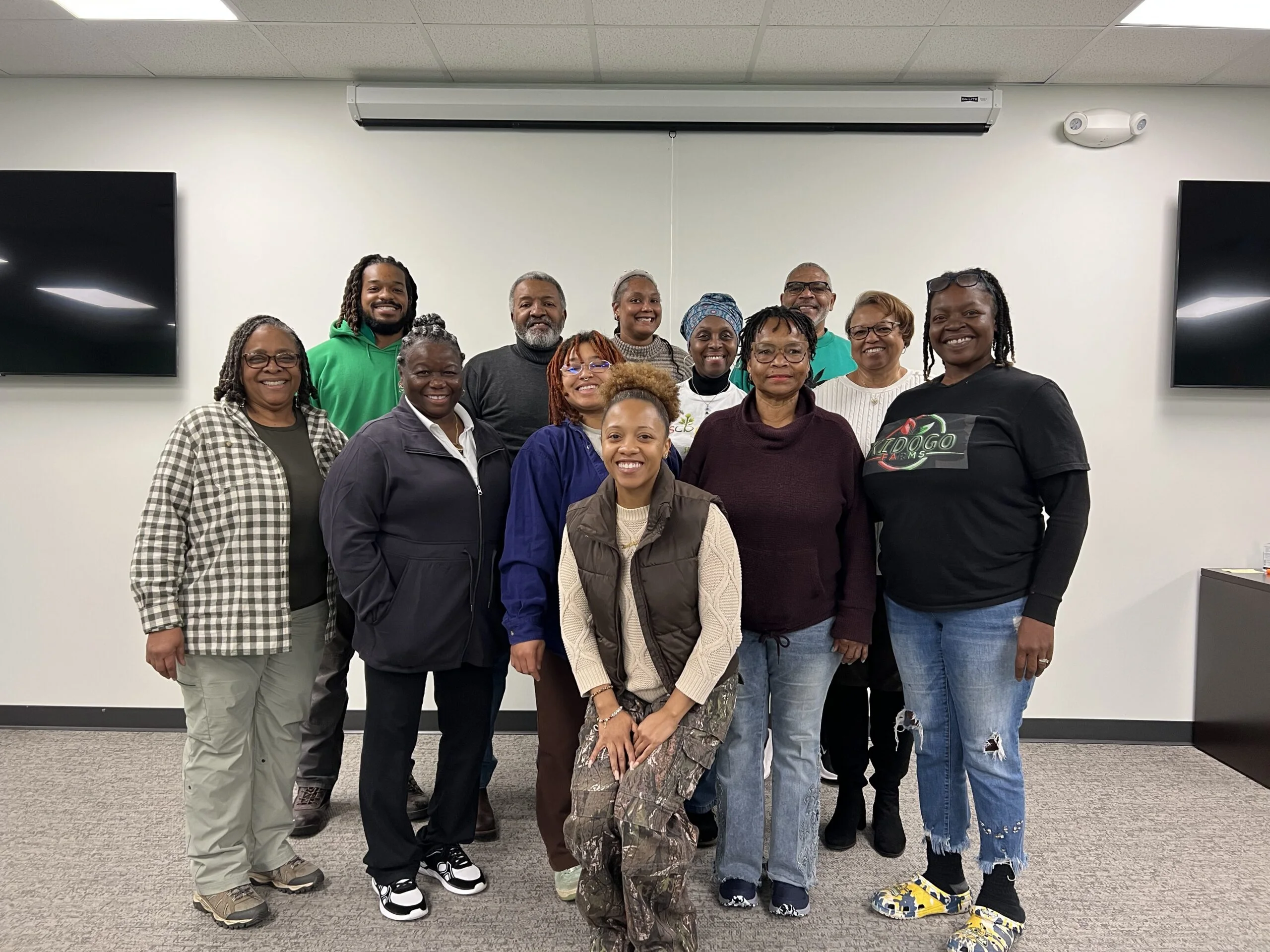 A group poses together after a community gathering.