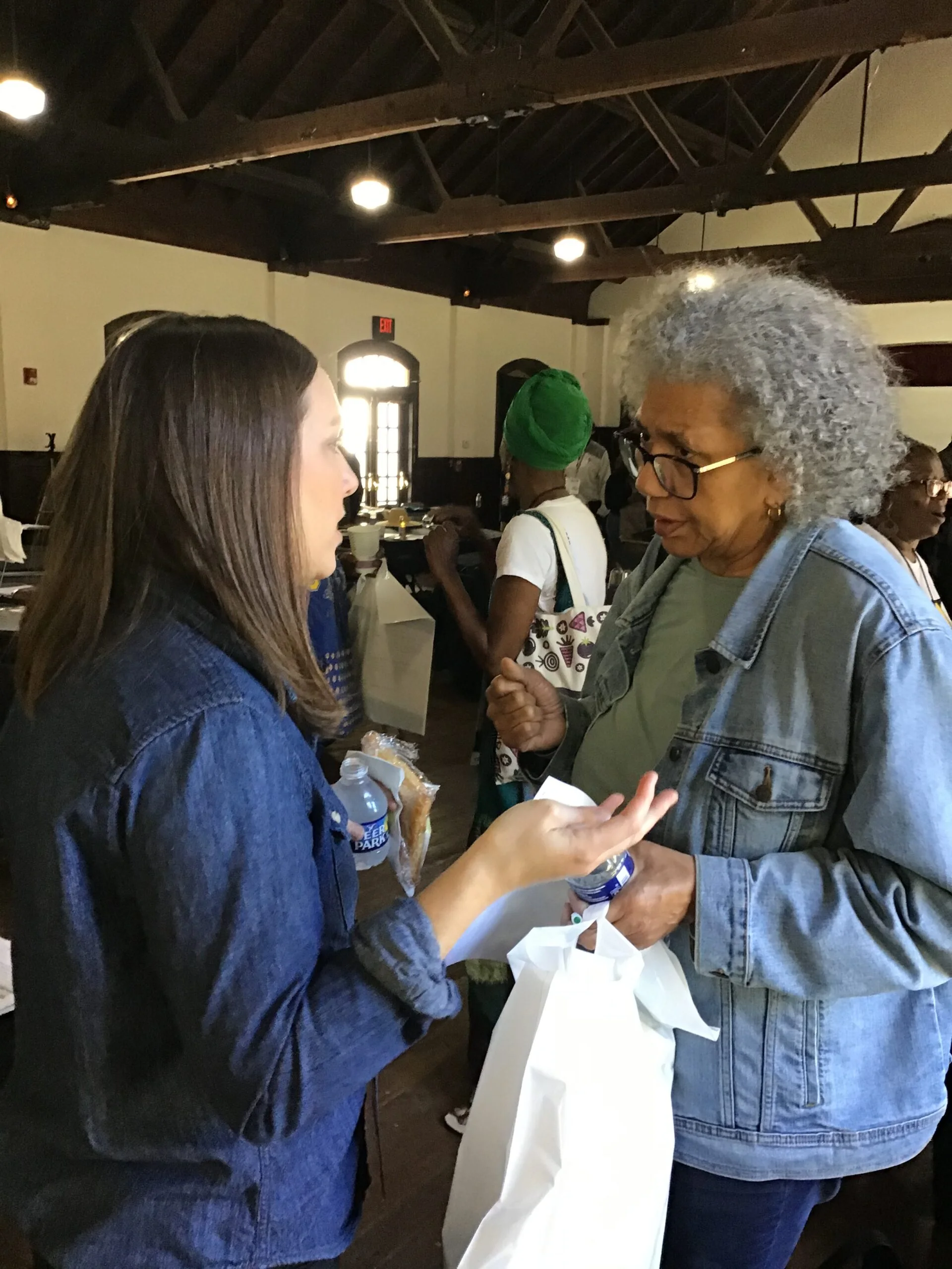 People talk together during a Coalition workshop.