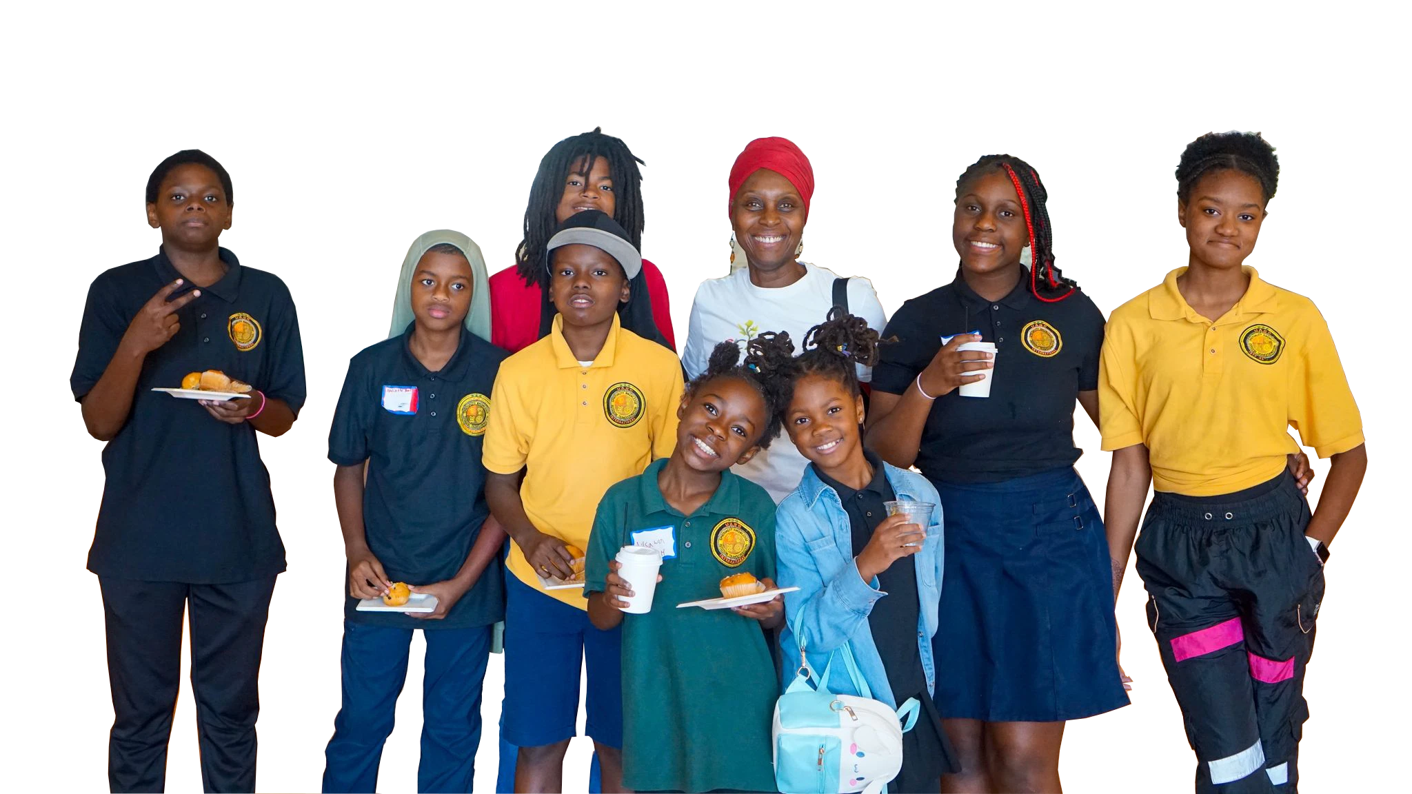 A group of young people and a mentor smile together at a Coalition youth event.