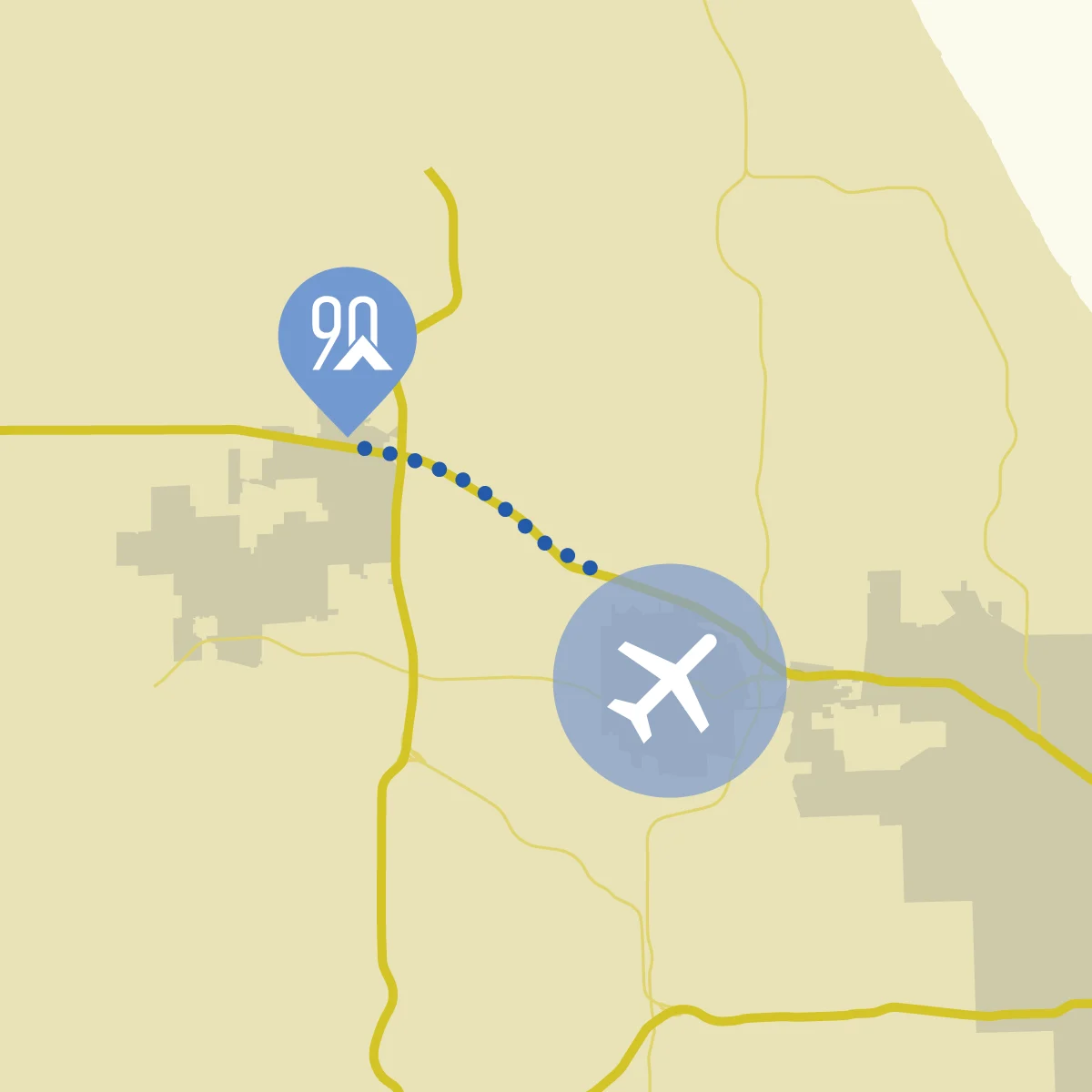 Map of the northwest suburbs: a 90 North pin beside I-90, a dotted line from it to O'Hare International Airport, and the Lake Michigan shore at the top right