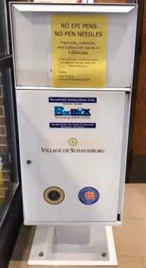 The RxBOX medication drop box, a sign on top reading No Epi Pens, No Pen Needles