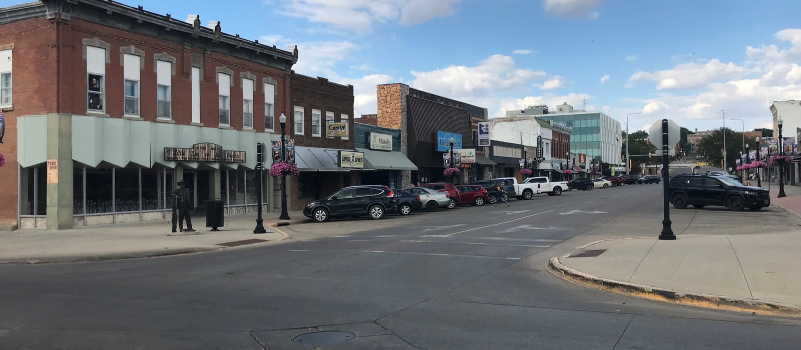 Downtown Pierre, South Dakota, looking along the main street on a clear afternoon.