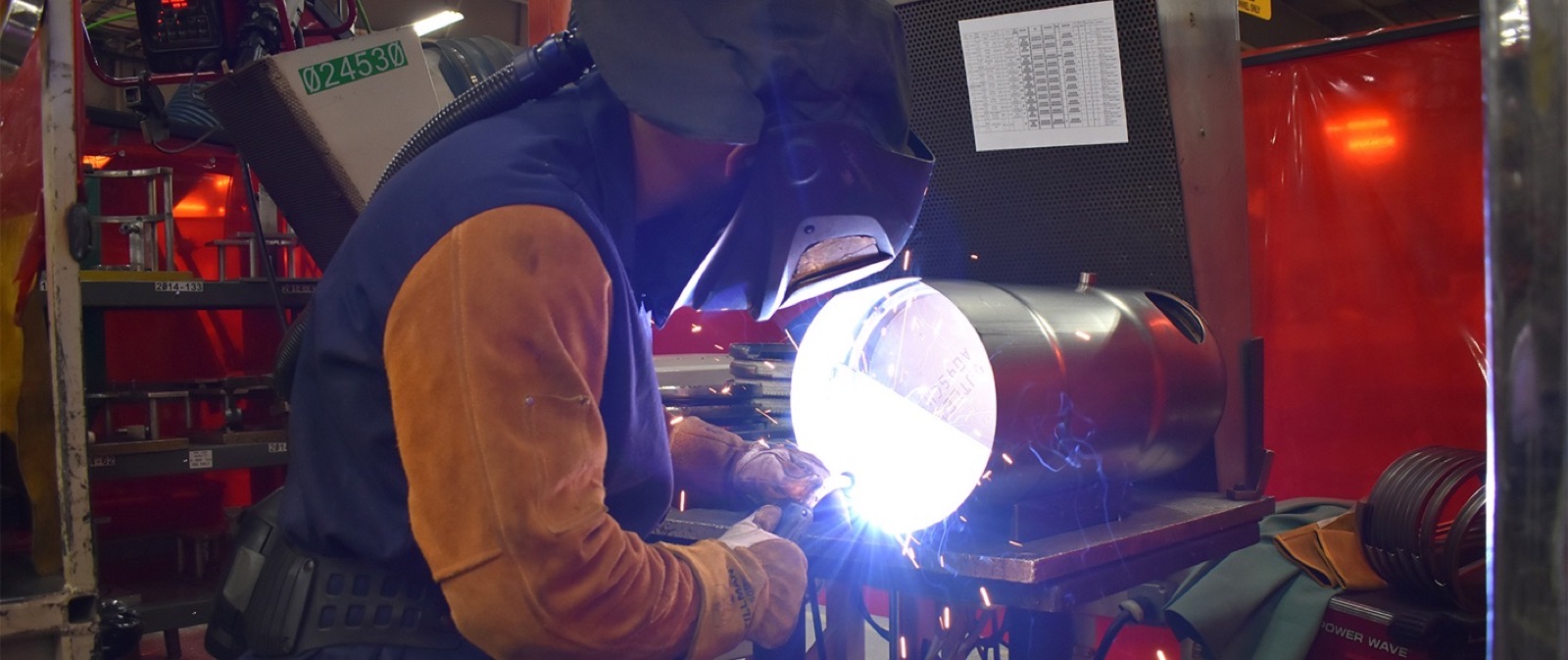 A Southwest Tech welding student runs a bright arc bead in the Fennimore shop