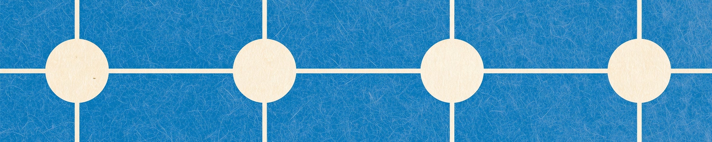 A woven blue grid with four cream circles