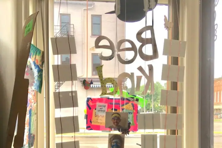 The front window of The Hive located in Nelsonville, Ohio.