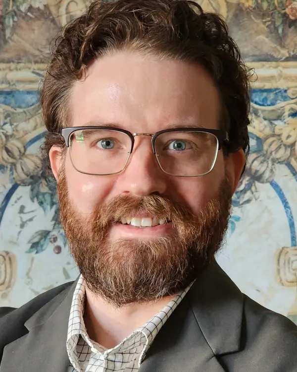 Portrait of Joshua Groll.
