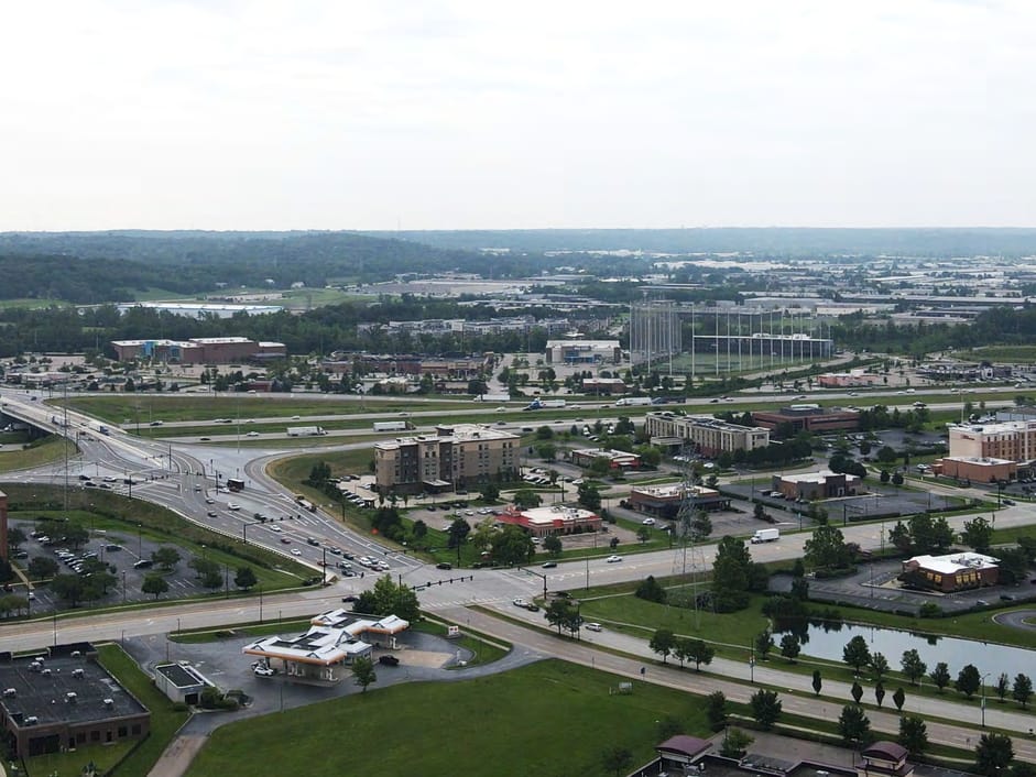 Aerial view of the Union Centre Boulevard interchange on Interstate 75, with offices and hotels beyond.