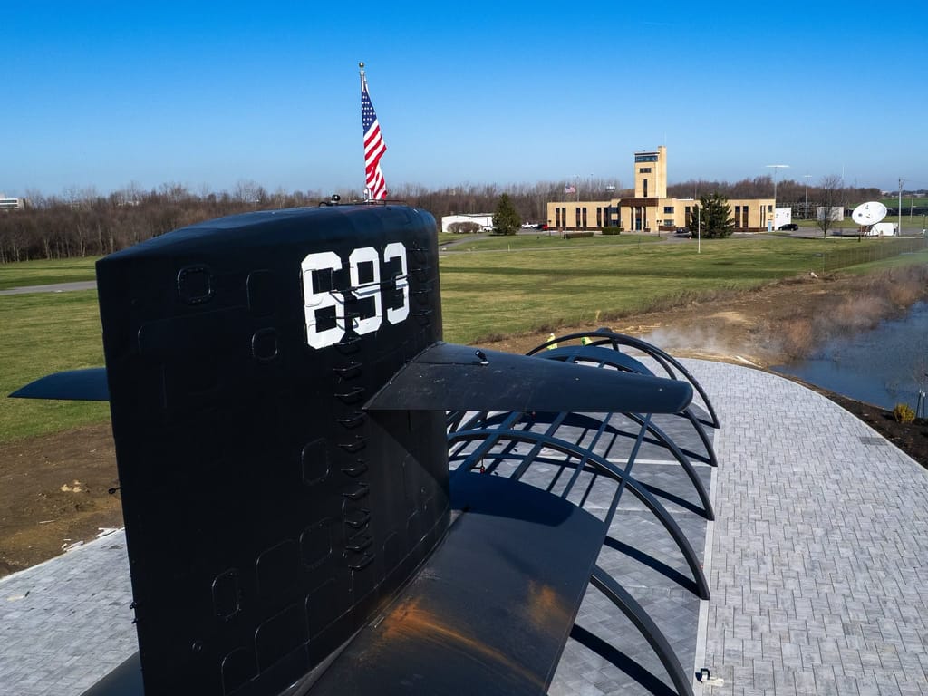 The USS Cincinnati Peace Pavilion with the VOA Museum of Broadcasting behind it.